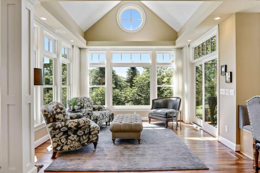 Sun room with sliding glass door to the patio. Check out the ocular window.