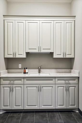 Mud room with new quartzite counter top and new sink.