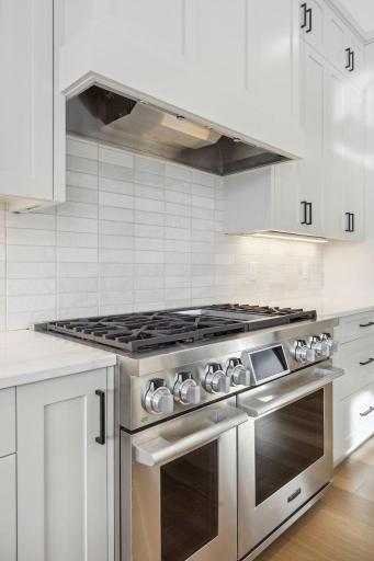 48" gas range with griddle, and dual ovens