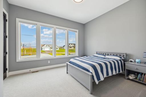 Main level bedroom/ensuite #2 with a large closet, and full bathroom!