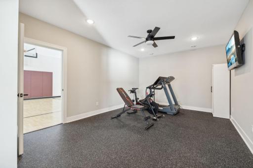 Lower level workout room and entry to sport court