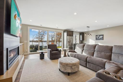 Lower level family room walks out to lakeside patio