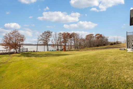 87' of beautiful level shoreline, and a wonderful flat yard for all sorts of activities!