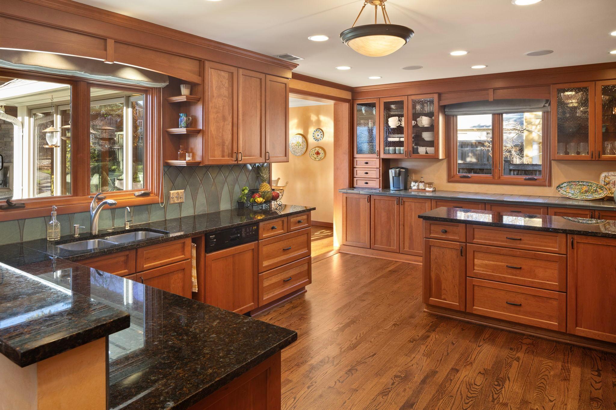 2764 W Lake of the Isles - kitchen opens to both family room and breakfast/sunroom and looks out to the backyard.