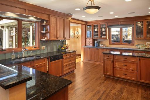 2764 W Lake of the Isles - kitchen opens to both family room and breakfast/sunroom and looks out to the backyard.
