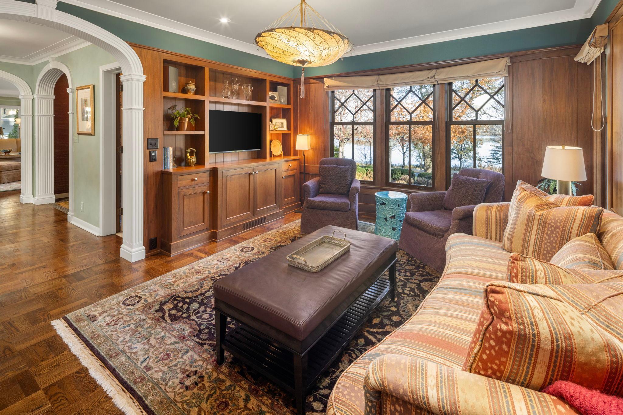 2764 W Lake of the Isles - front study/den with custom paneling and lovely views