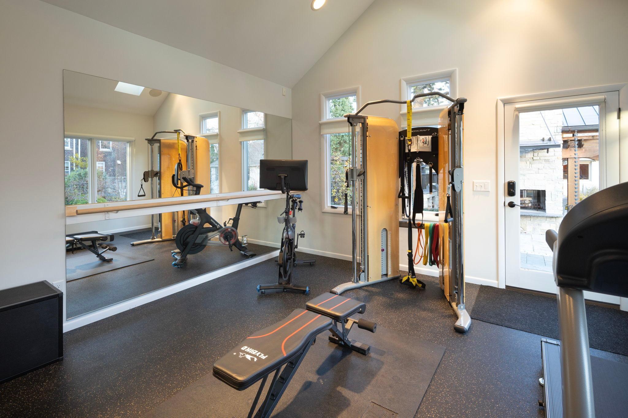 2764 W Lake of the Isles - high-ceilinged, conditioned flex space/exercise room. Access to garage too.