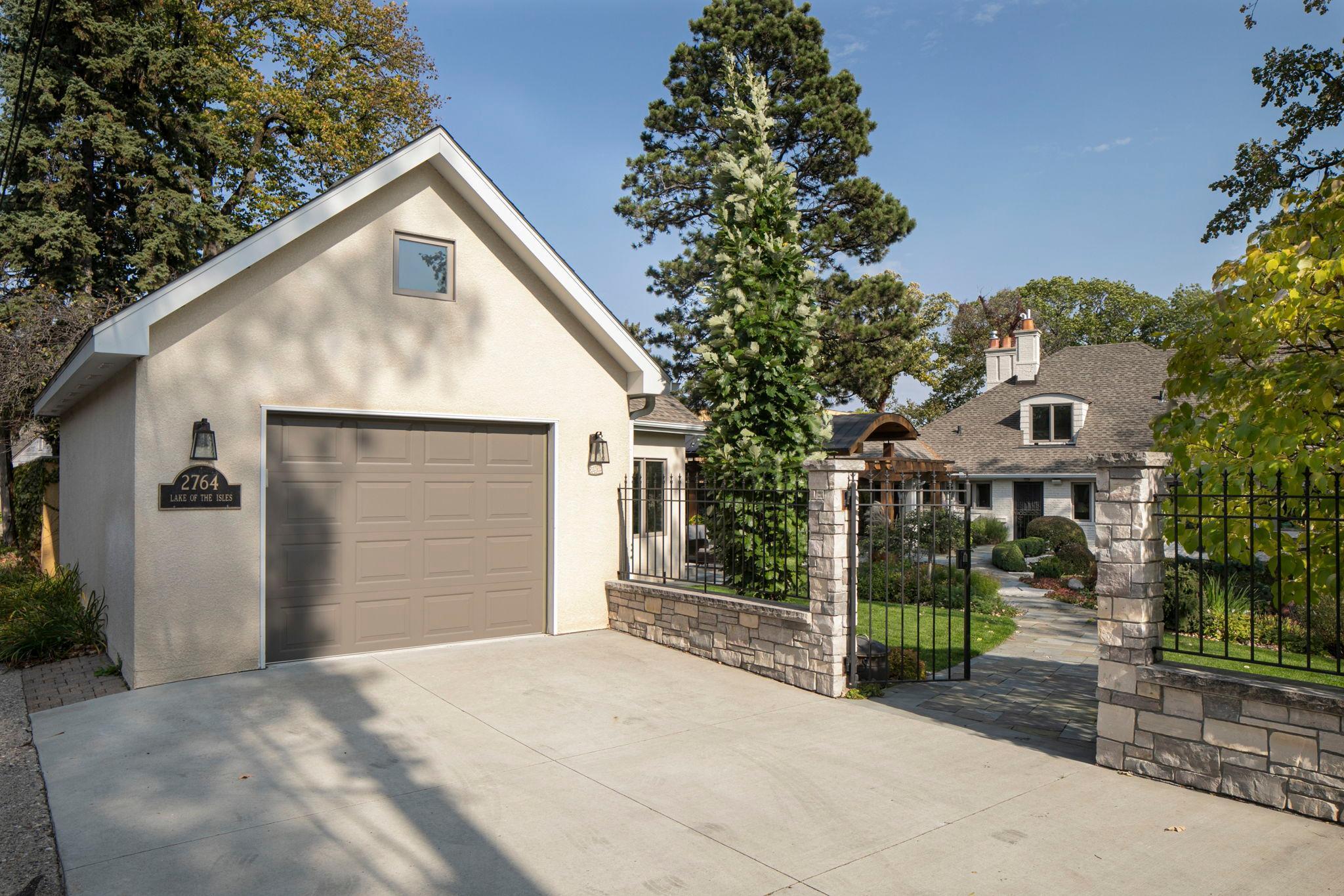 2764 W Lake of the Isles - Alley access to the 3rd garage stall and exercise/flex space