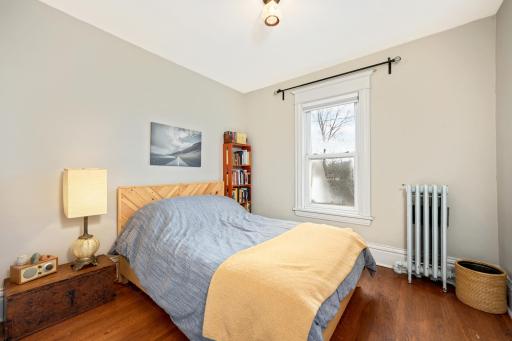 Experience serenity in yet another bedroom, where the lake and park views yet again create a tranquil escape.