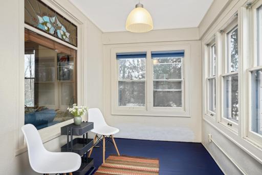 Savor the changing tapestry of the outdoors from the comfort of a three-season porch, where panoramic lake views create a seamless blend of nature and relaxation.