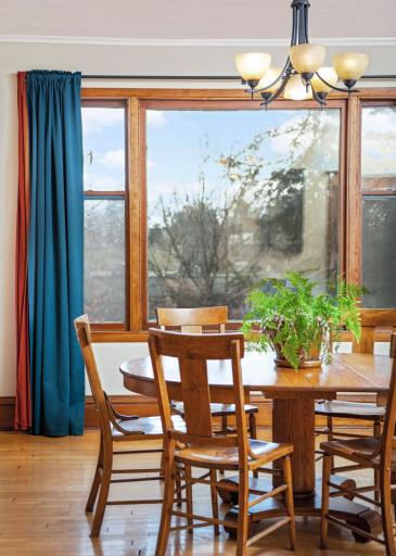 Furthermore, panoramic windows frame picturesque views of the adjacent lake and park can be found in the dining room, creating an inviting and scenic backdrop for every meal.