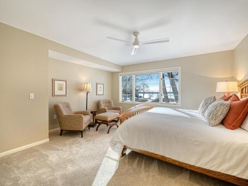 Expansive primary suite with siting area overlooking the lake!