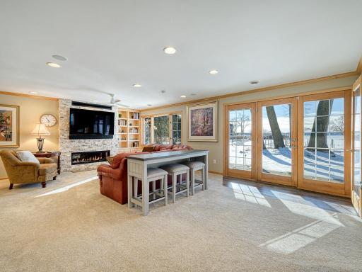 The lower level is a walkout with tons of natural light and lake views.