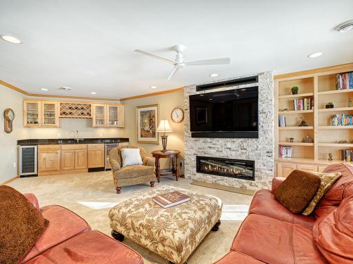 New stone surround fireplace in the lower level!