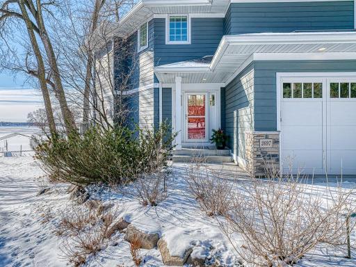 New Hardie siding and 3rd garage stall+storage added on to the home!