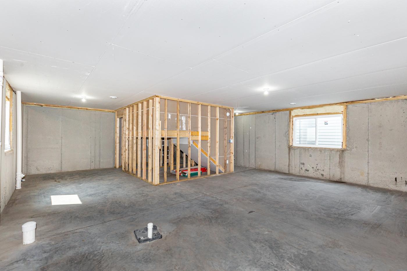 Unfinished Basement - Room for family room, bathroom, and bedroom