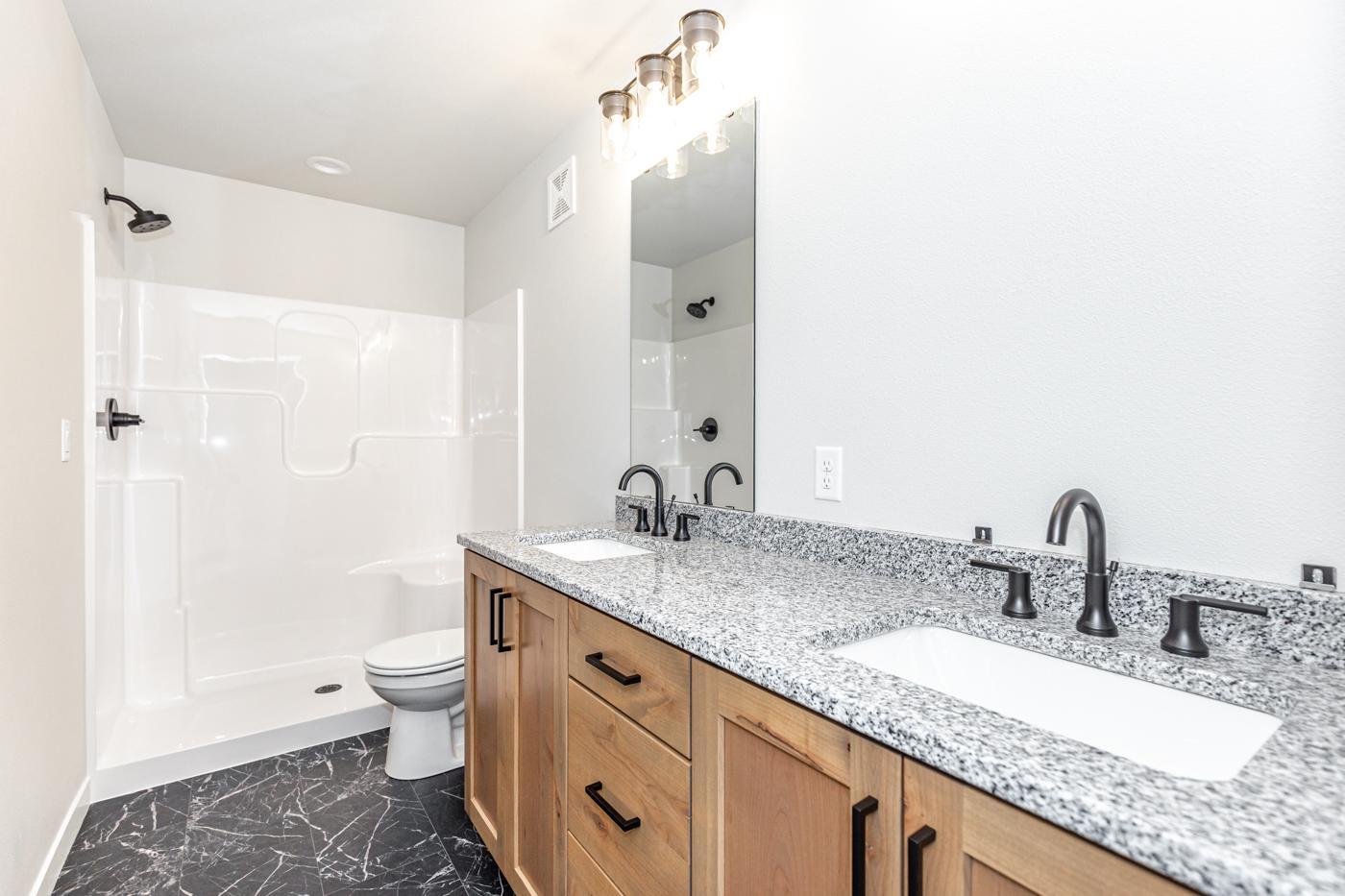 Primary Bath - Granite top w/ soft close cabinets!