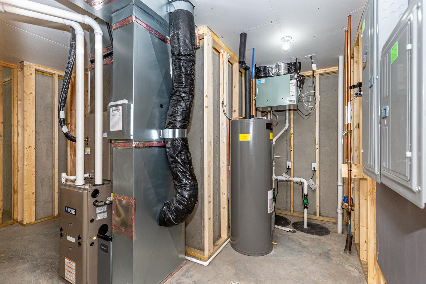 Mechanical - Air exchanger, dual sump pits and pumps, sump bypass to sewer, & passive radon!