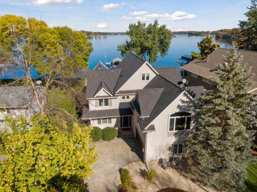 Welcome to 2166 Shadywood Rd in Orono! .43 acre lot with 62' of east facing shoreline.