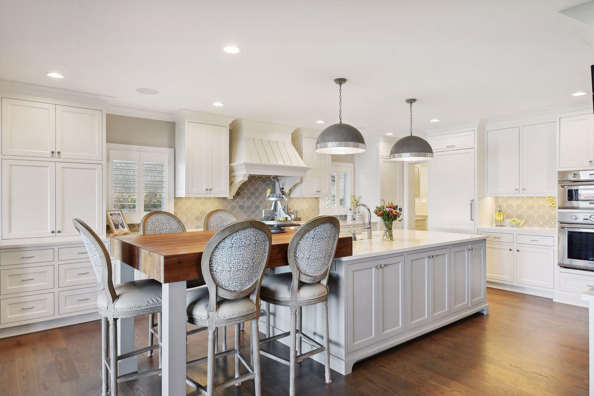 Gourmet kitchen with cambria counter tops, 6 burner gas stove, wall oven & steam oven.