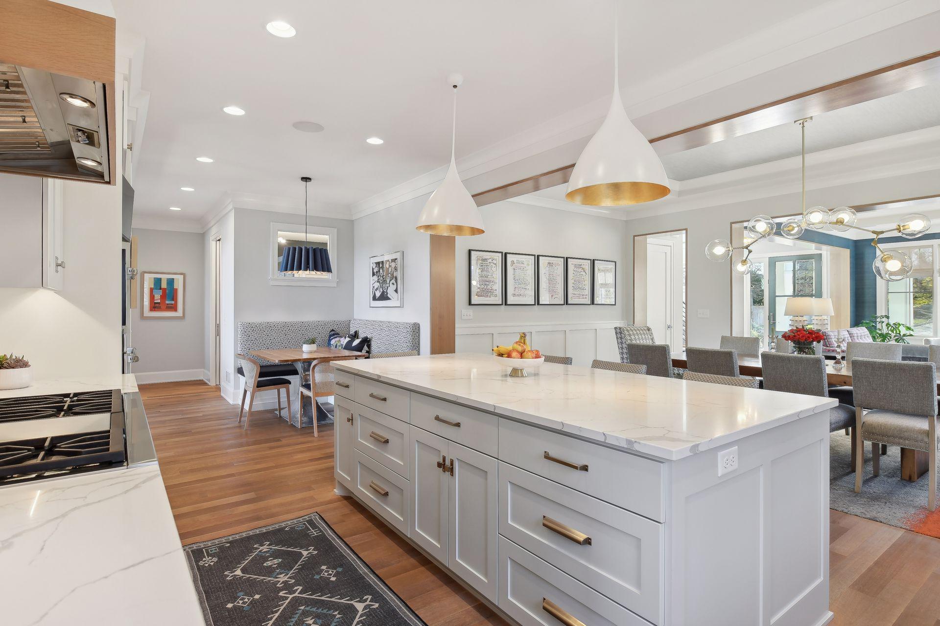 Don't miss the custom built-in kitchen booth in the corner! So much wonderful seating throughout.