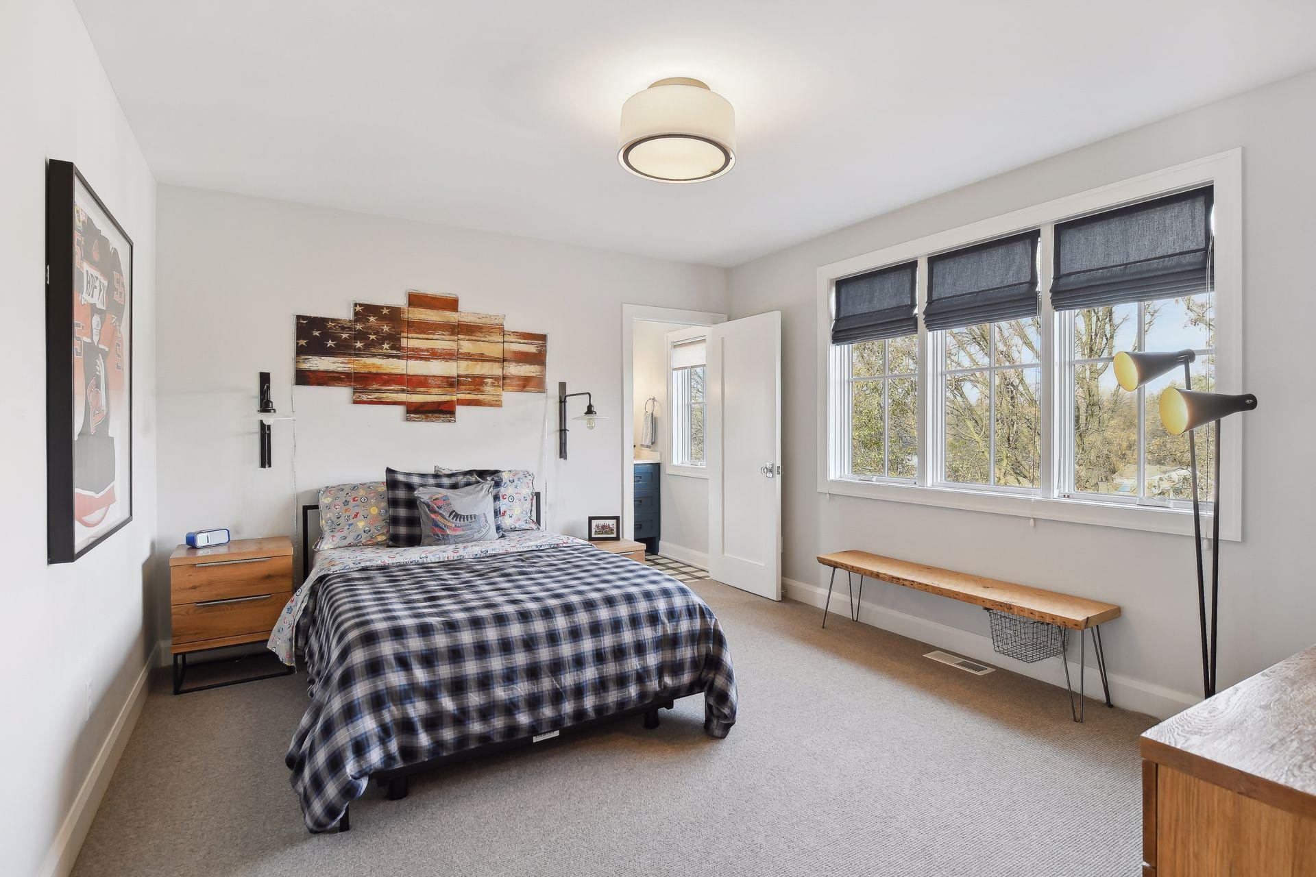 Bedroom #2 on the upper level has an ensuite 3/4 bath & walk-in closet.