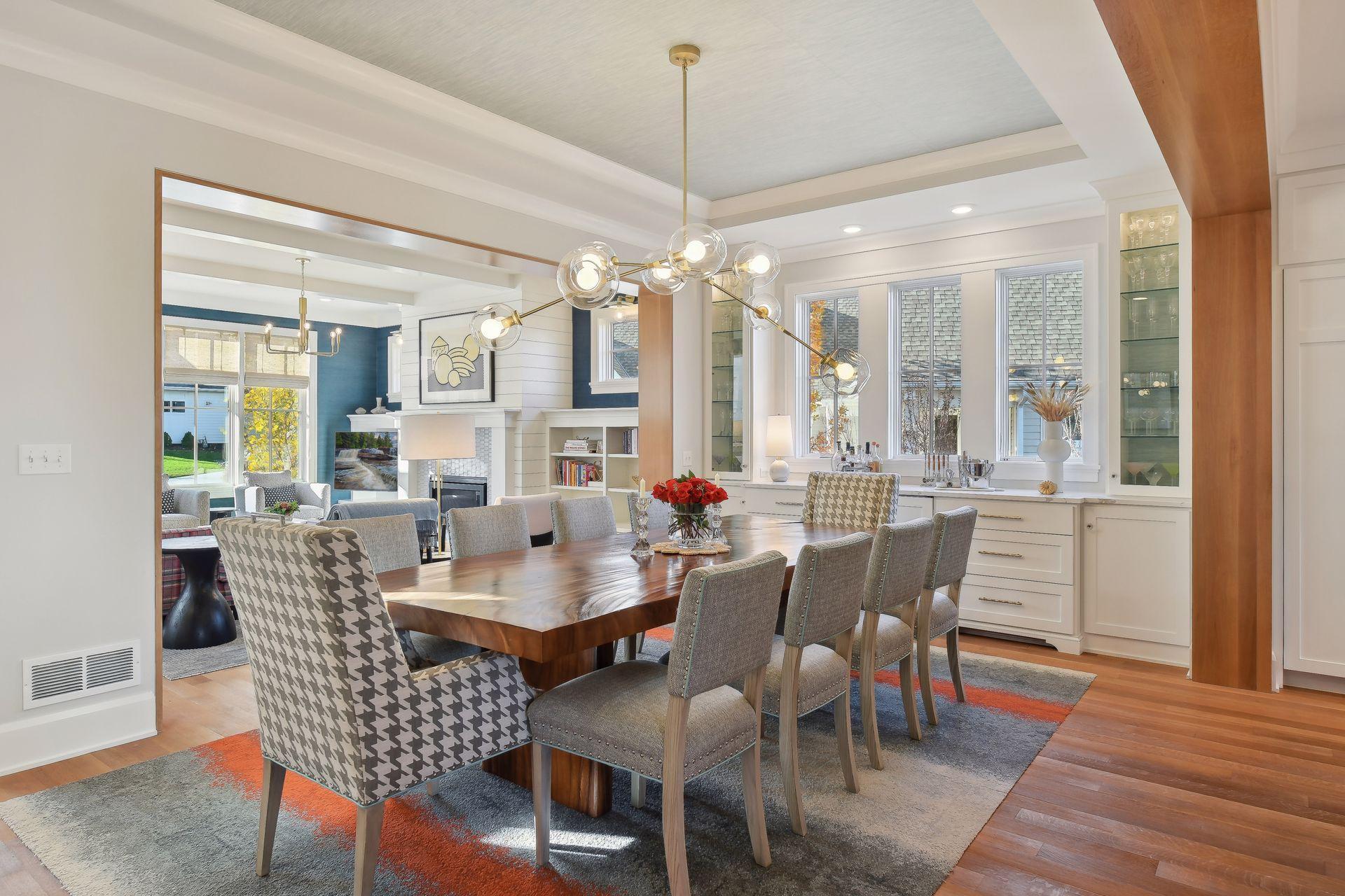 A beautiful buffet with built-in glass cabinets provides the perfect area for entertaining.