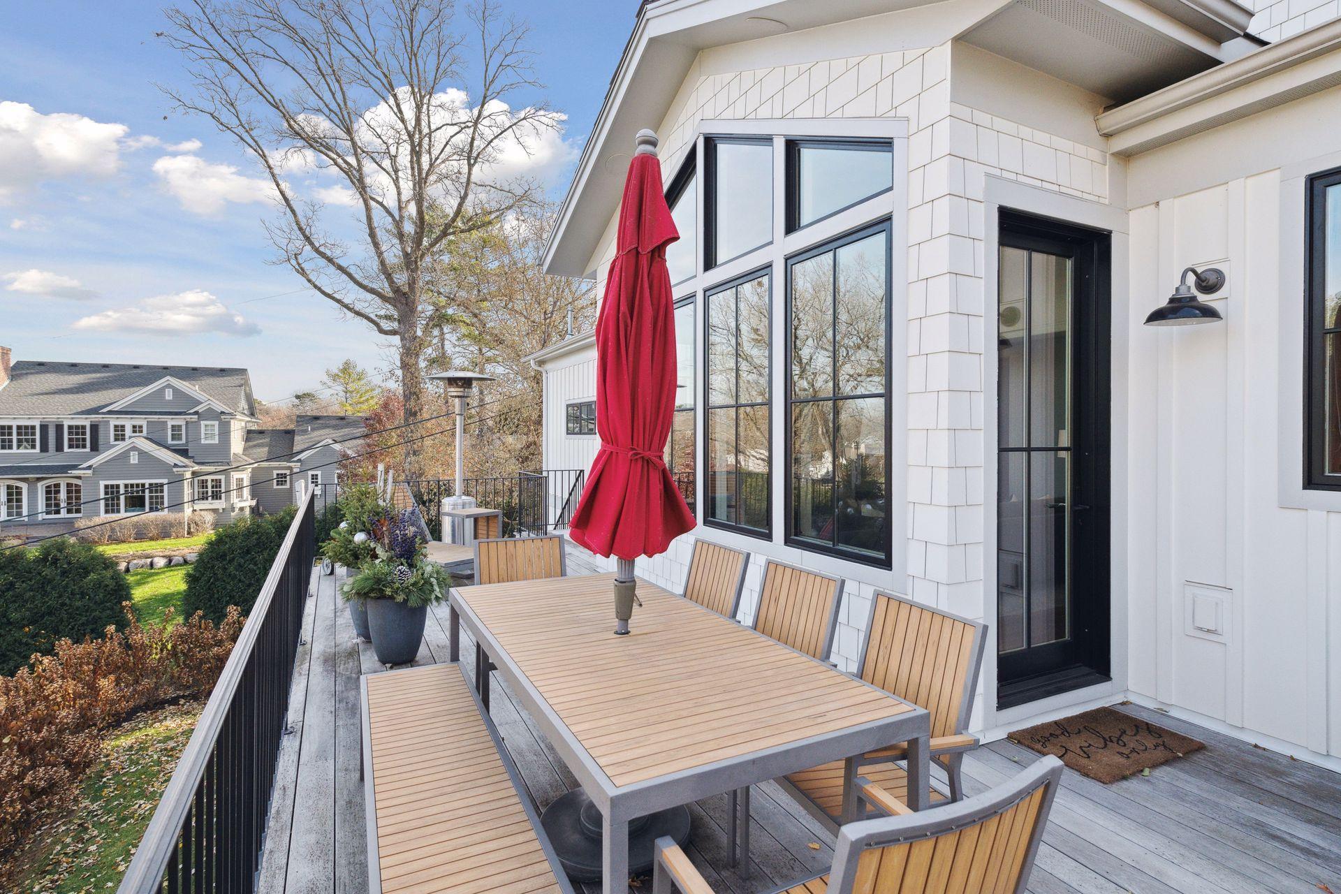 The private deck off the family room is manufactured with IPE artificial wood. It patinas over time to a beautiful silver finish.