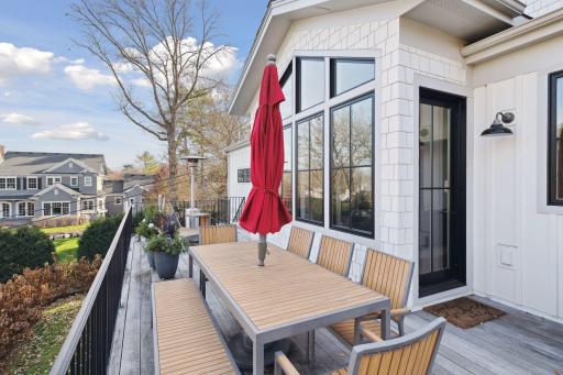 The private deck off the family room is manufactured with IPE artificial wood. It patinas over time to a beautiful silver finish.