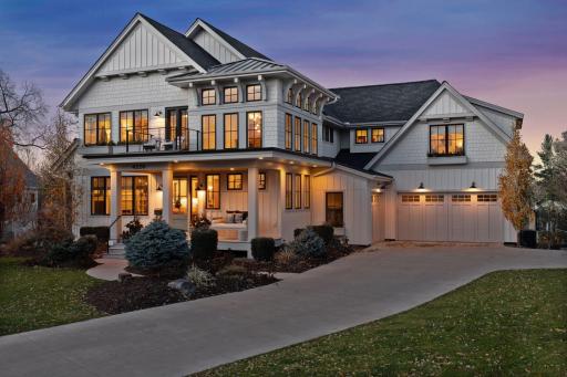 The home's exterior design truly is Cape Cod meets urban farmhouse with fantastic curb appeal in the cul-de-sac. Professionally landscaped front and back yards add to the appeal.