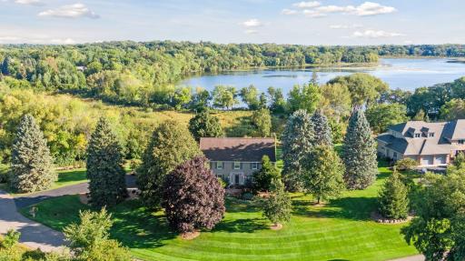 Tucked away at the end of a cul-de-sac, with backyard facing Pleasant Lake, you'll enjoy picture perfect views of Pleasant Lake all year long! And you're sure to appreciate the added privacy of neighbors only to one side of the property.
