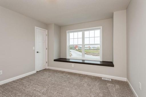 Bedroom with a bench.