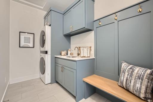 Main level laundry. Photos of model at 5655 Buffington.
