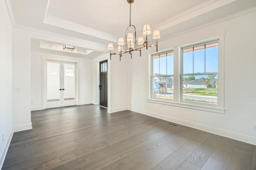 Beautiful ceiling details with crown moulding, box vault and Ralph Lauren lighting!