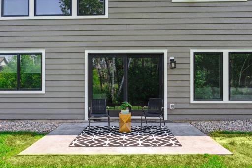 Cape Cod Gray Stamp concrete patio to complement the exterior of the home