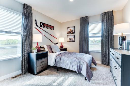 Each of the homes three additional bedrooms are also abundant in size! (Photo of model, colors may vary)
