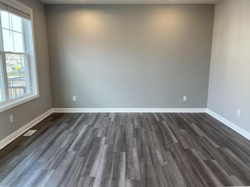 Soaked in natural sunlight, the homes eat-in dining room has ample room for a dining table located in the heart of the home.