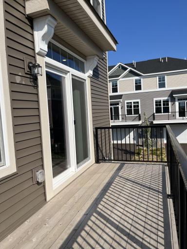 Relax, sunbath or grill out on your back porch. Conveniently located adjacent to the dining and kitchen area, this outdoor oasis is delightful during all seasons.