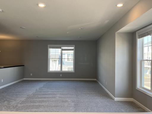 Notice all the natural light pouring into the family room.