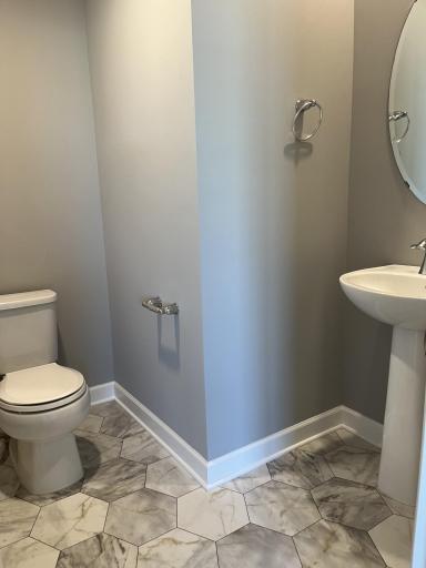 The powder room is conveniently located off the family room.