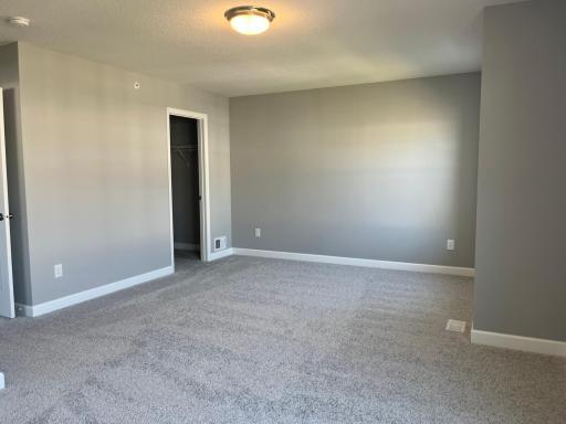 Spacious, imaginative and modern would best describe an owner's suite. This suite offers a serene setting and includes private access to a en-suite bath and two walk-in closets.