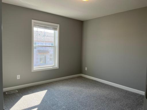 Each of the home's secondary bedrooms on the upper level come perfectly sized and all feature a spacious closet.