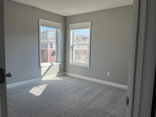 Each of the home's secondary bedrooms on the upper level come perfectly sized and all feature a spacious closet.