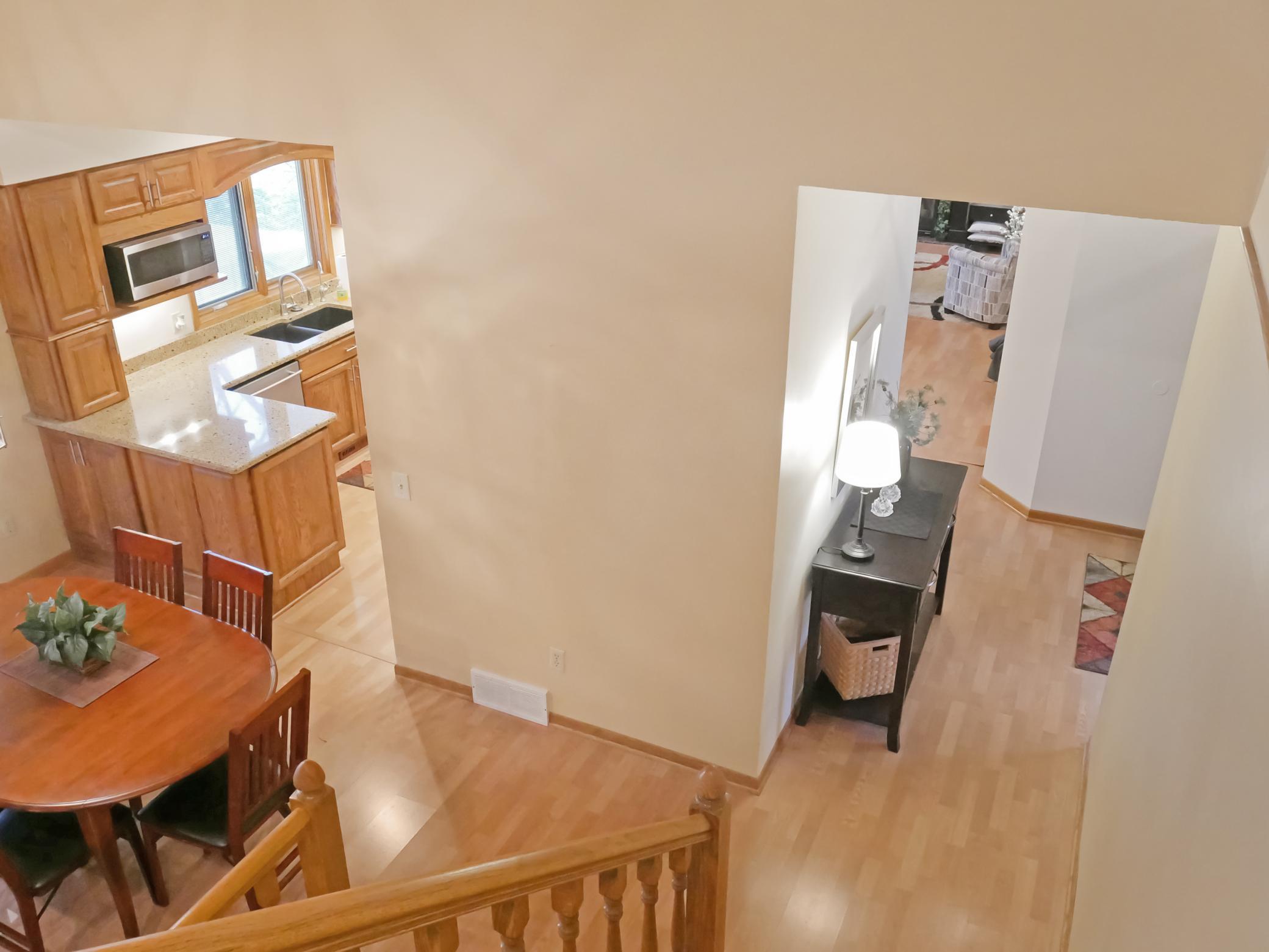 Stairs to Dining Area from Upper-Level Family Room.