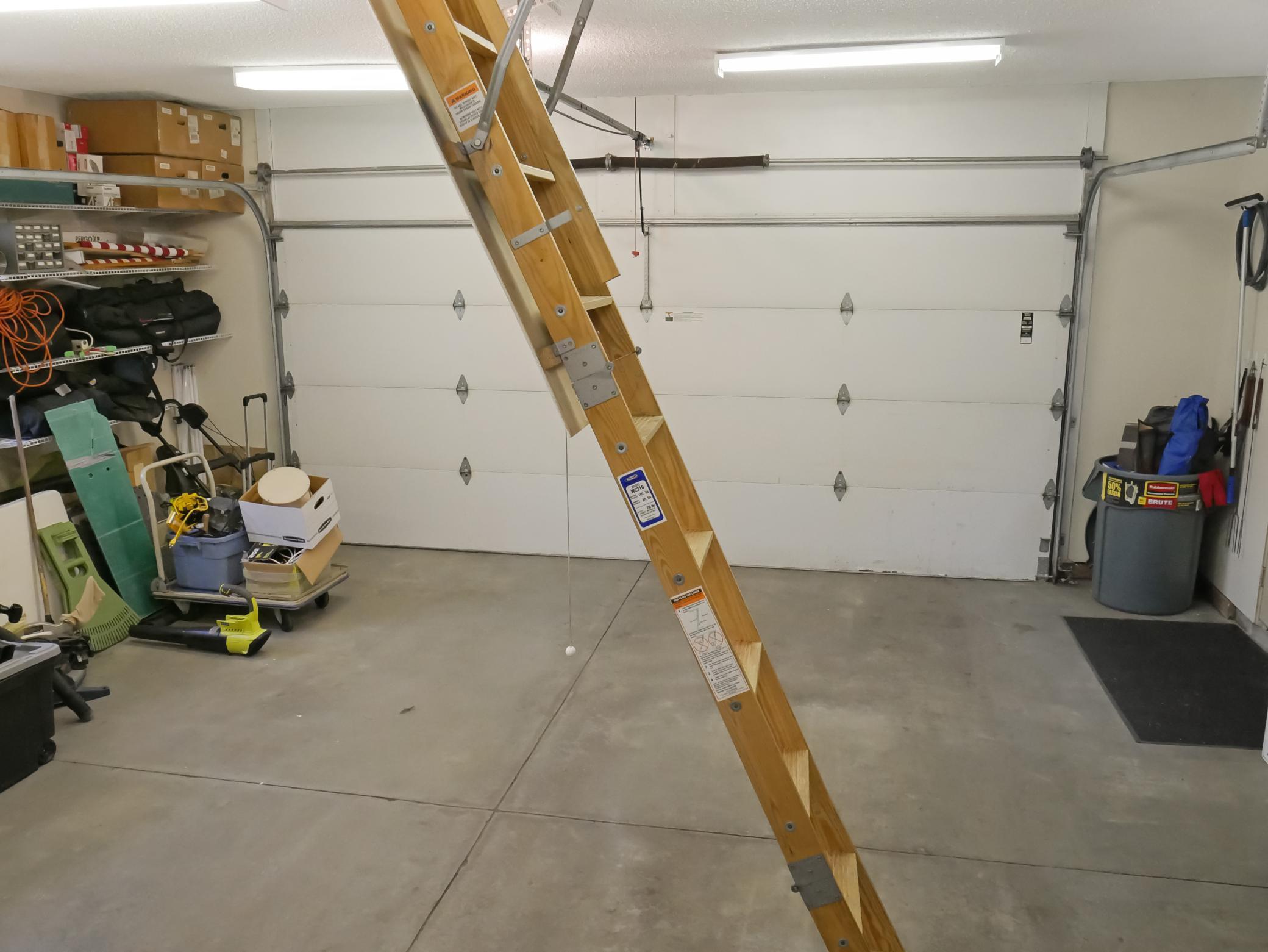 Heated and Oversized 2 car Garage with Attic access storage.