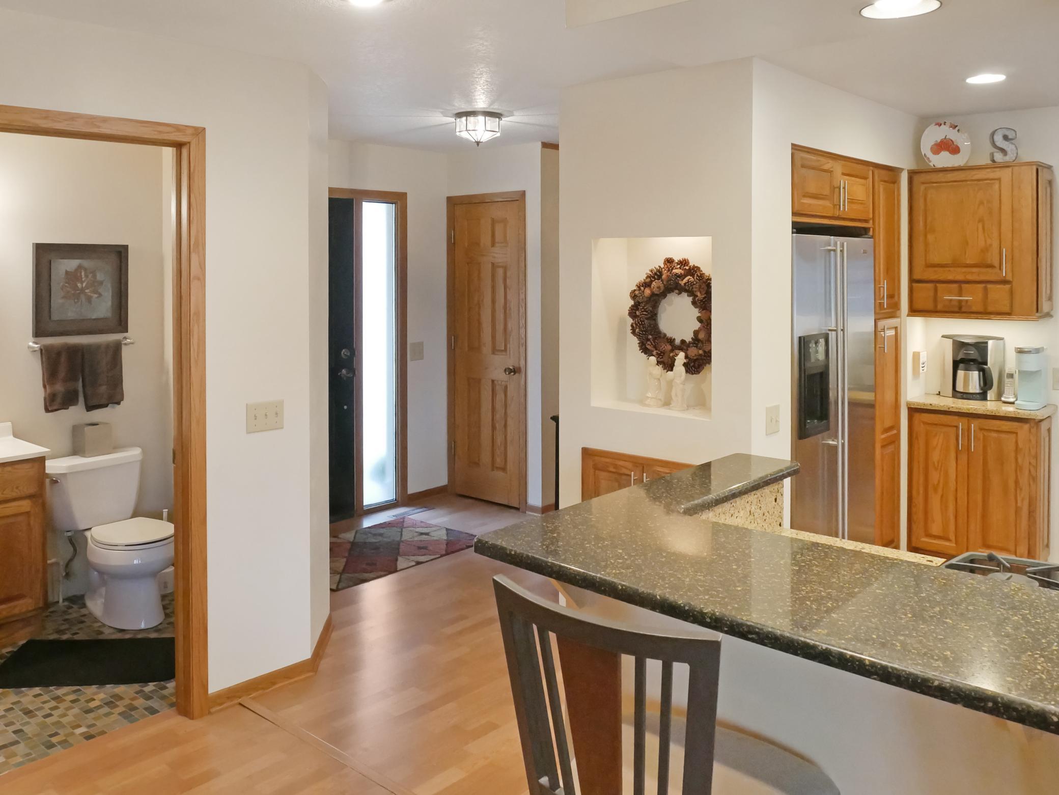 Entryway offers plenty of space to remove shoes and a large coat closet for easy access.