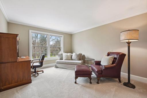 In use as a home office, this spacious room is the fourth bedroom. on the second floor.