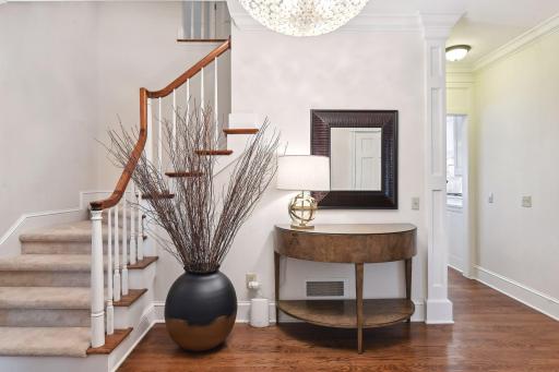 Greet guests and family in the spacious foyer with charming staircase