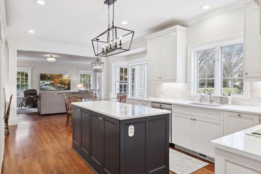 And entertainers dream with easy flow to informal dining, formal dining, family room and cozy sunroom.