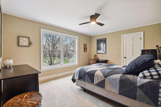 Beautiful treed views! This secondary bedroom includes a very large walk-in closet!